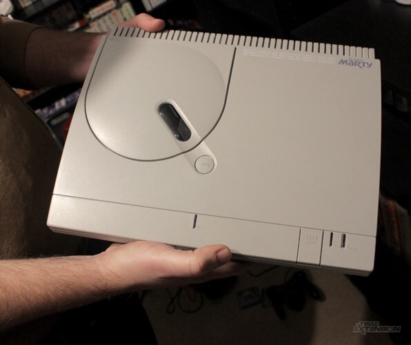 The FM Towns Marty(left) and some of the games playable on the device (right)